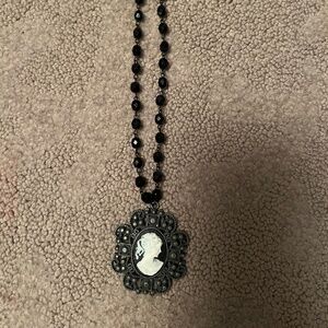 Cameo necklace or can be worn as choker.
